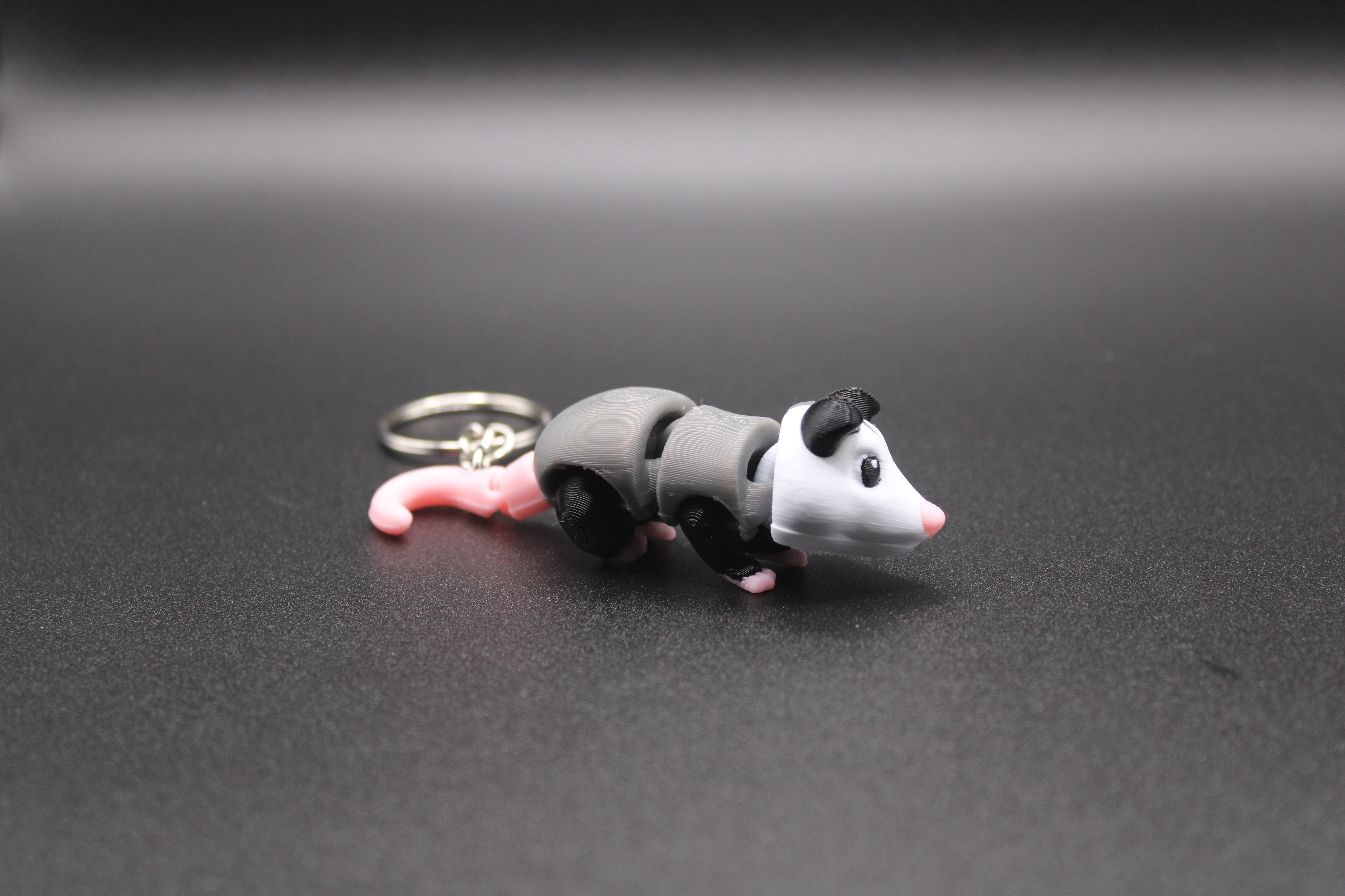 Patches - Articulating Possum Keychain